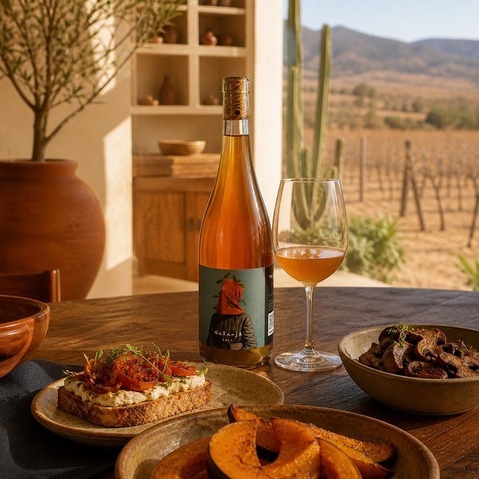 Anónimo Naranja servido con queso de cabra, jitomate asado, calabaza y hongos