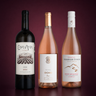 Casa Anza Reserva Blanco, Bruma Ocho Rosé y Zorzal Pinot Noir Rosé sobre fondo vino