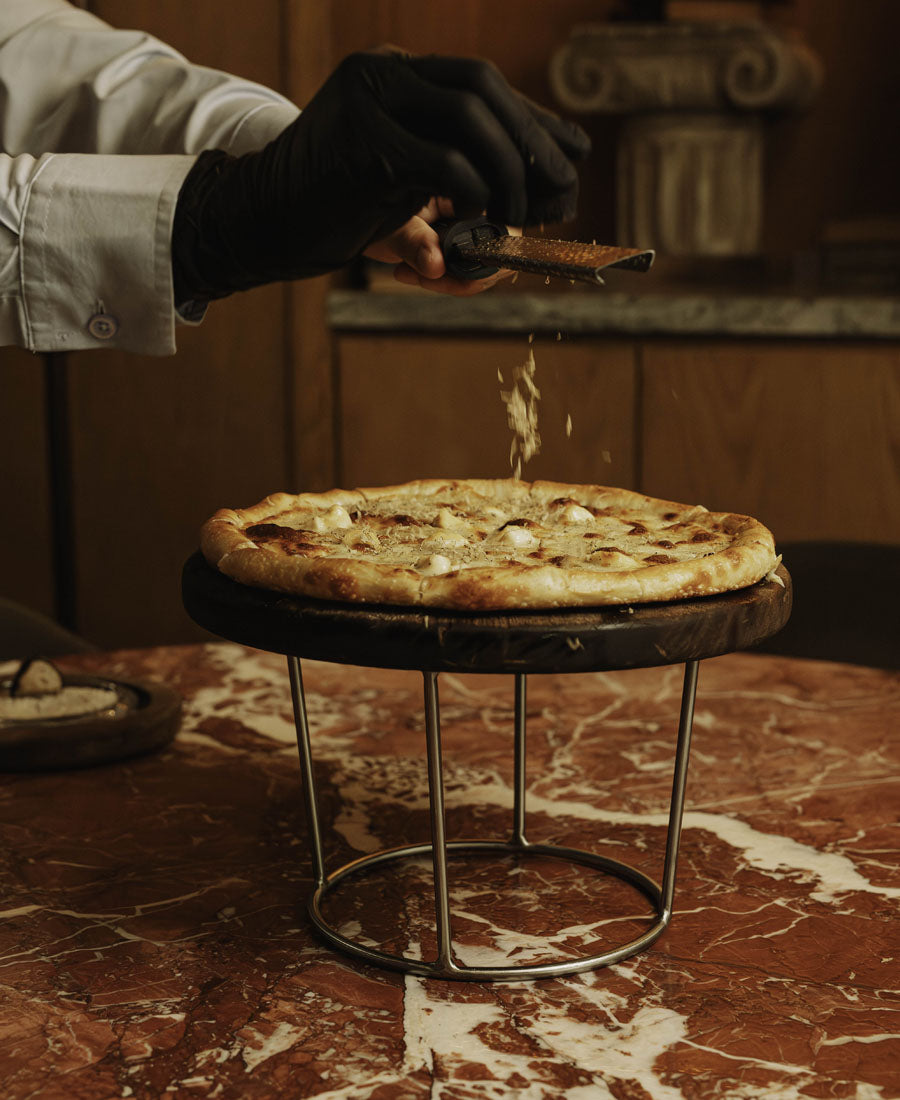 Preparación de pizza en Grupo Pasta